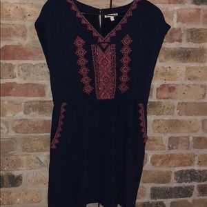 Navy sundress with coral stitching